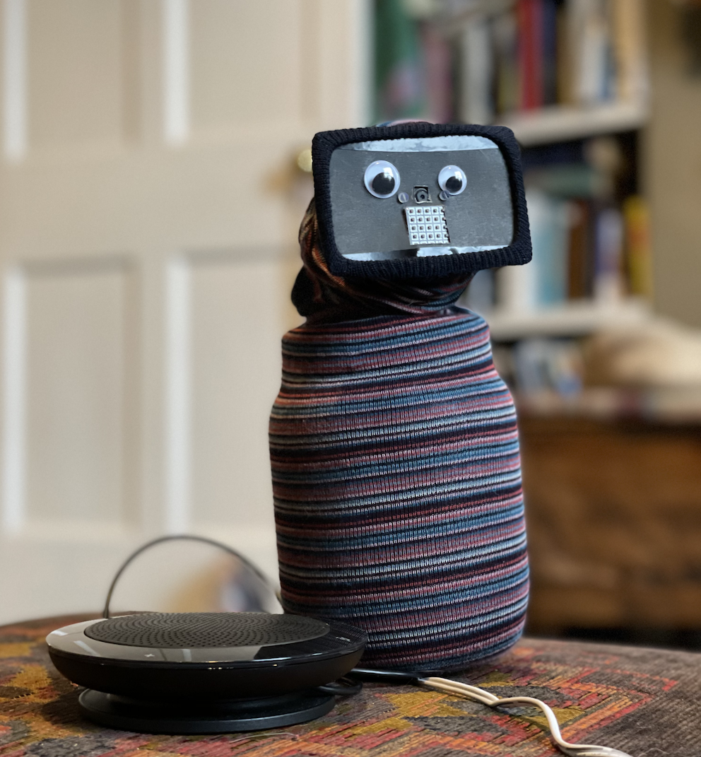 a presence robot wearing an elegant stripy sock
